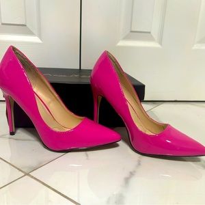 Pink high heels.